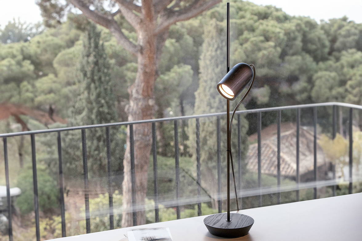 The Ofna table lamp in black ash and graphite finishes. The Ofna table lamp in black ash and graphite finishes.