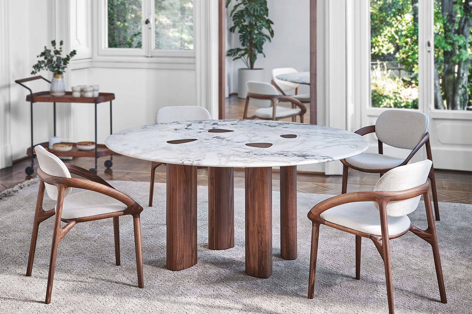 Oswood round dining table designed by Patrick Jouin