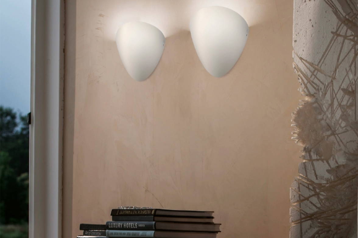 Ovalina Wall Sconce above a sideboard Ovalina Wall Sconce above a sideboard