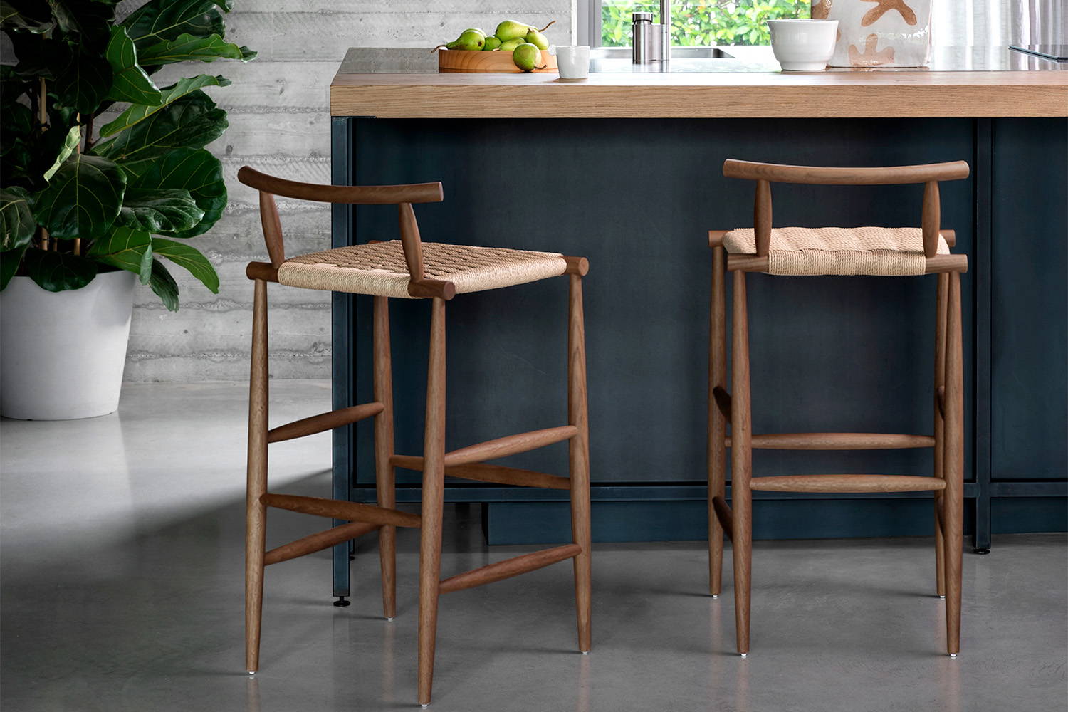 Pelleossa Counter Stool features a wood frame in select oak finishes