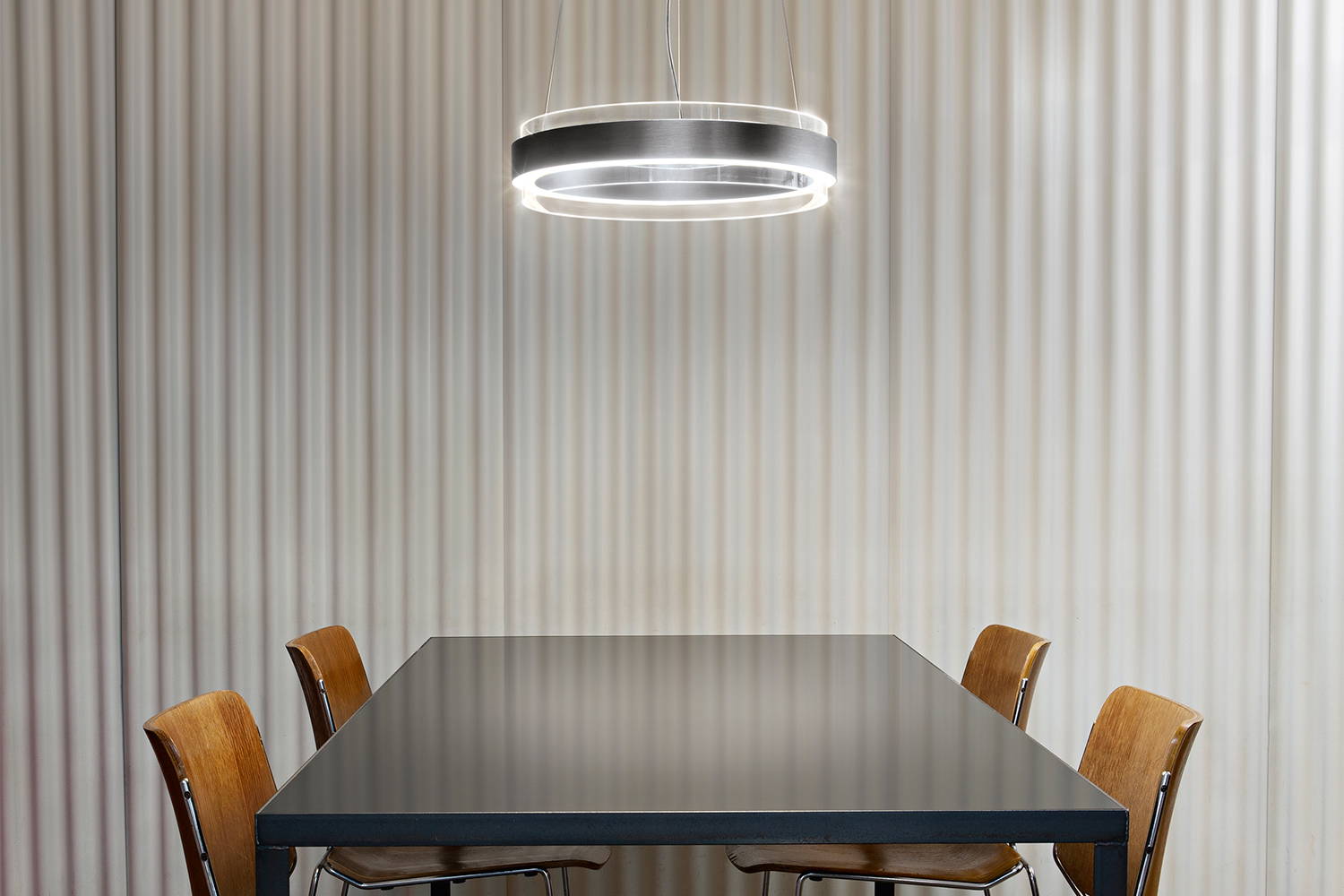Phoenix Suspension Light above dining table