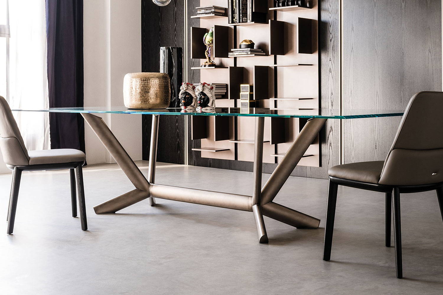Planer dining table with glass top and bronze base