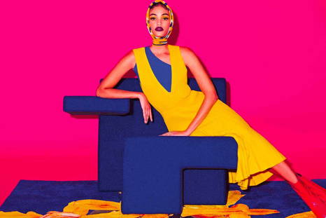 Woman sitting on Primitive Armchair 