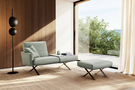 Rialto armchair in green with end table in living room setting by Gamma Arredamenti