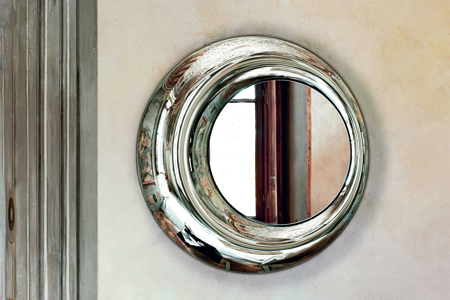 Rosy mirror designed by Doriana and Massimiliano Fuksas for Fiam Italia 