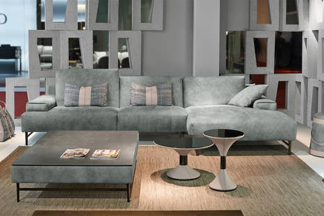 Saks sectional sofa with chaise in composition with Clepsydra end tables by Gamma