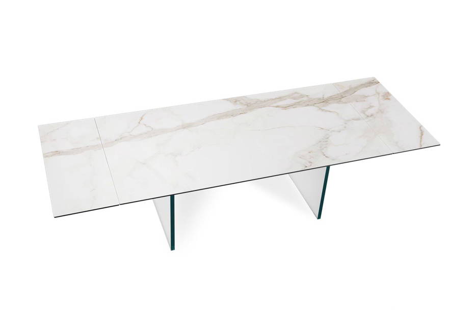 Santiago dining table by Naos (calacatta ceramic top, and clear glass legs)