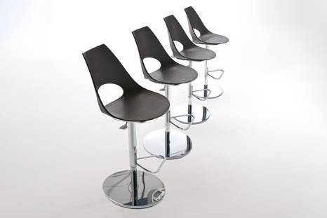 Shark adjustable bar stool features a polypropylene seating shell