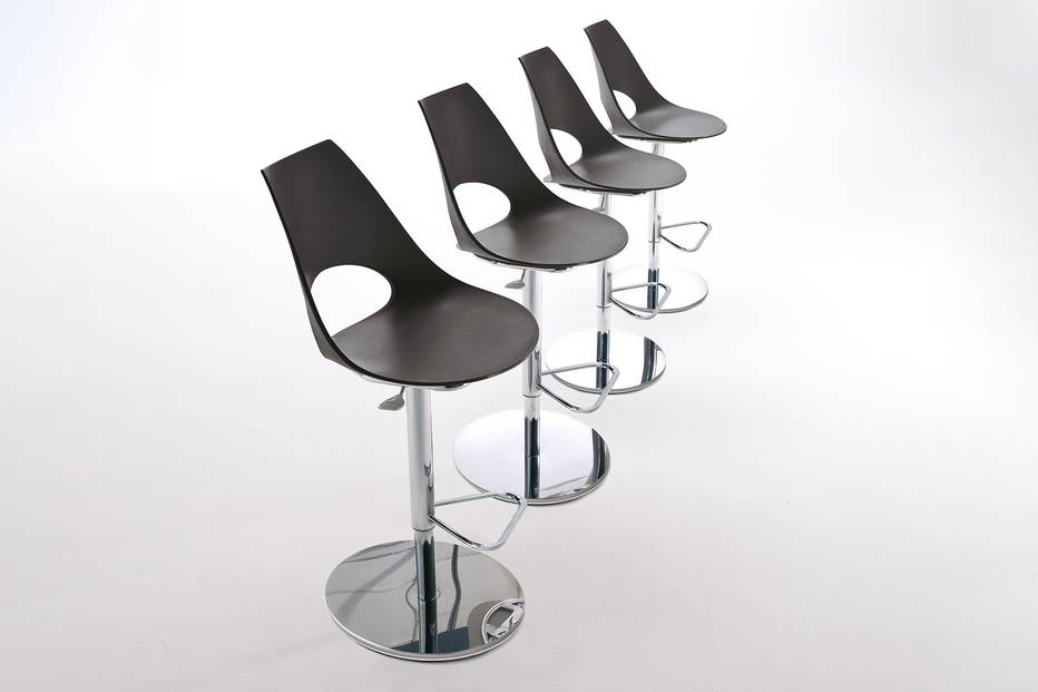 Shark adjustable bar stool features a polypropylene seating shell