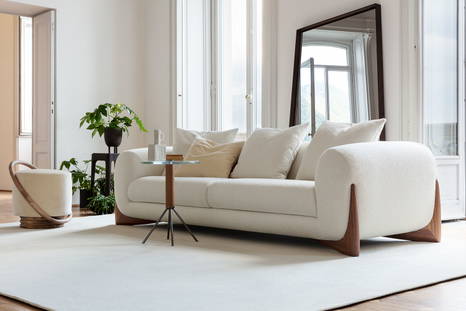 Softbay sofa with Jelly end table, Smile pouf, and Flag mirror by Porada