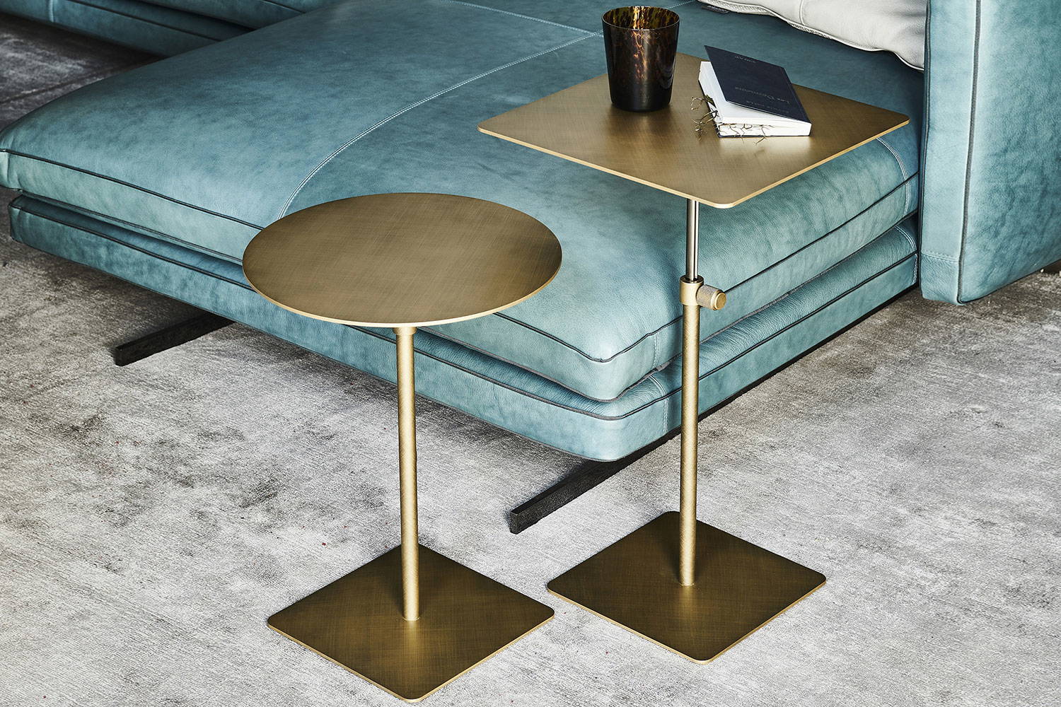 Step end tables in brushed brass finish