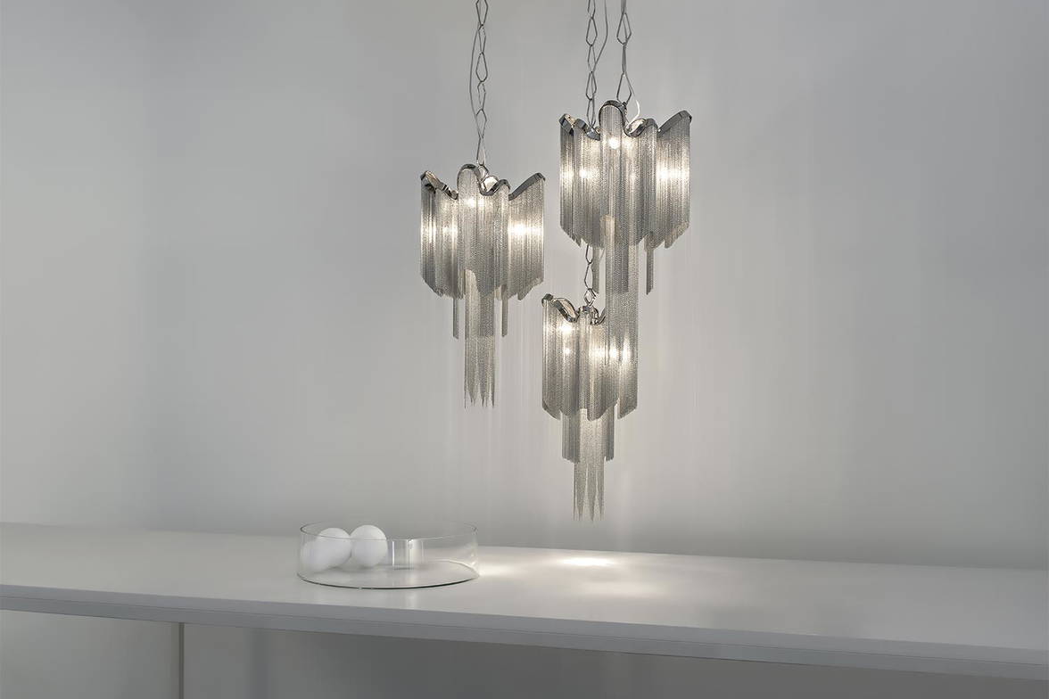 Stream suspension lights by Terzani at various heights Stream suspension lights by Terzani at various heights