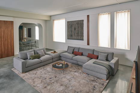 Sunset J-shape sectional sofa designed by Carlo Bimbi for Bontempi Casa
NOTE: Pictured with decorative metal feet at ends