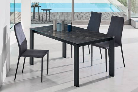 Tai dining chair features a metal frame build