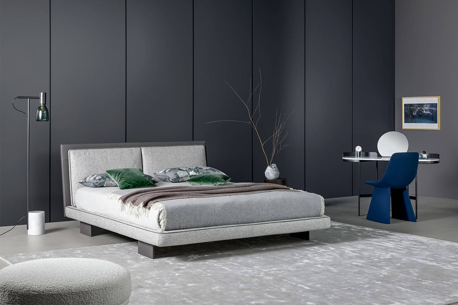 The Tara bed with the Acquerelli floor lamp and Asia desk.