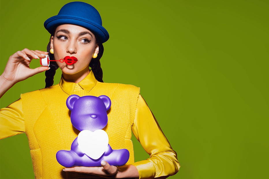 Woman holding Teddy Loves XS Table Lamp