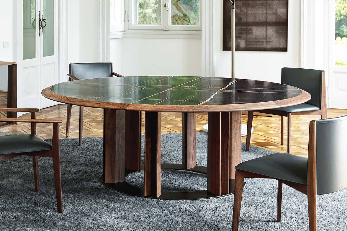 Thayl round dining table with Ionis dining chairs by Porada Thayl round dining table with Ionis dining chairs by Porada