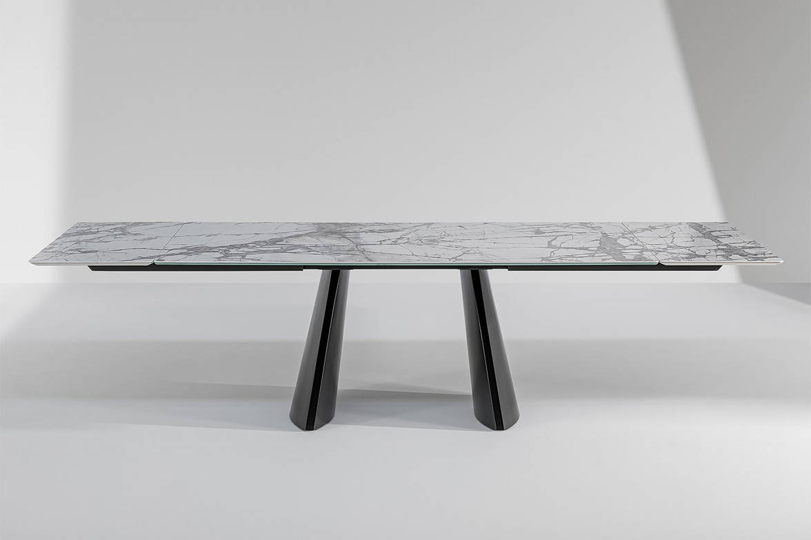 The Torii extension dining table by Marconato & Zappa for Bonaldo. The Torii extension dining table by Marconato & Zappa for Bonaldo.
