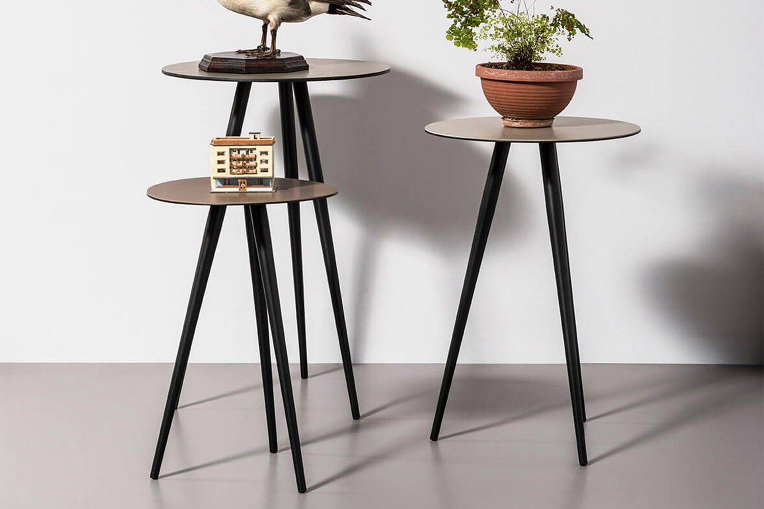 Trip ceramic end tables by Midj