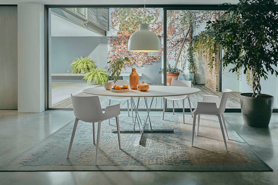 Viscount of Wood Oval Dining Table in chrome frame and ash finish in dining setting