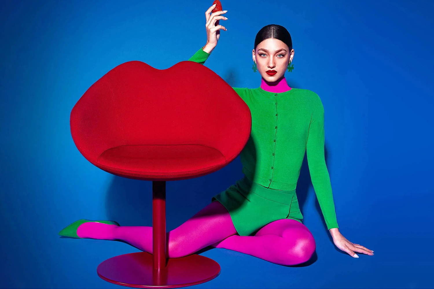 Woman with the XOXO Swivel Armchair